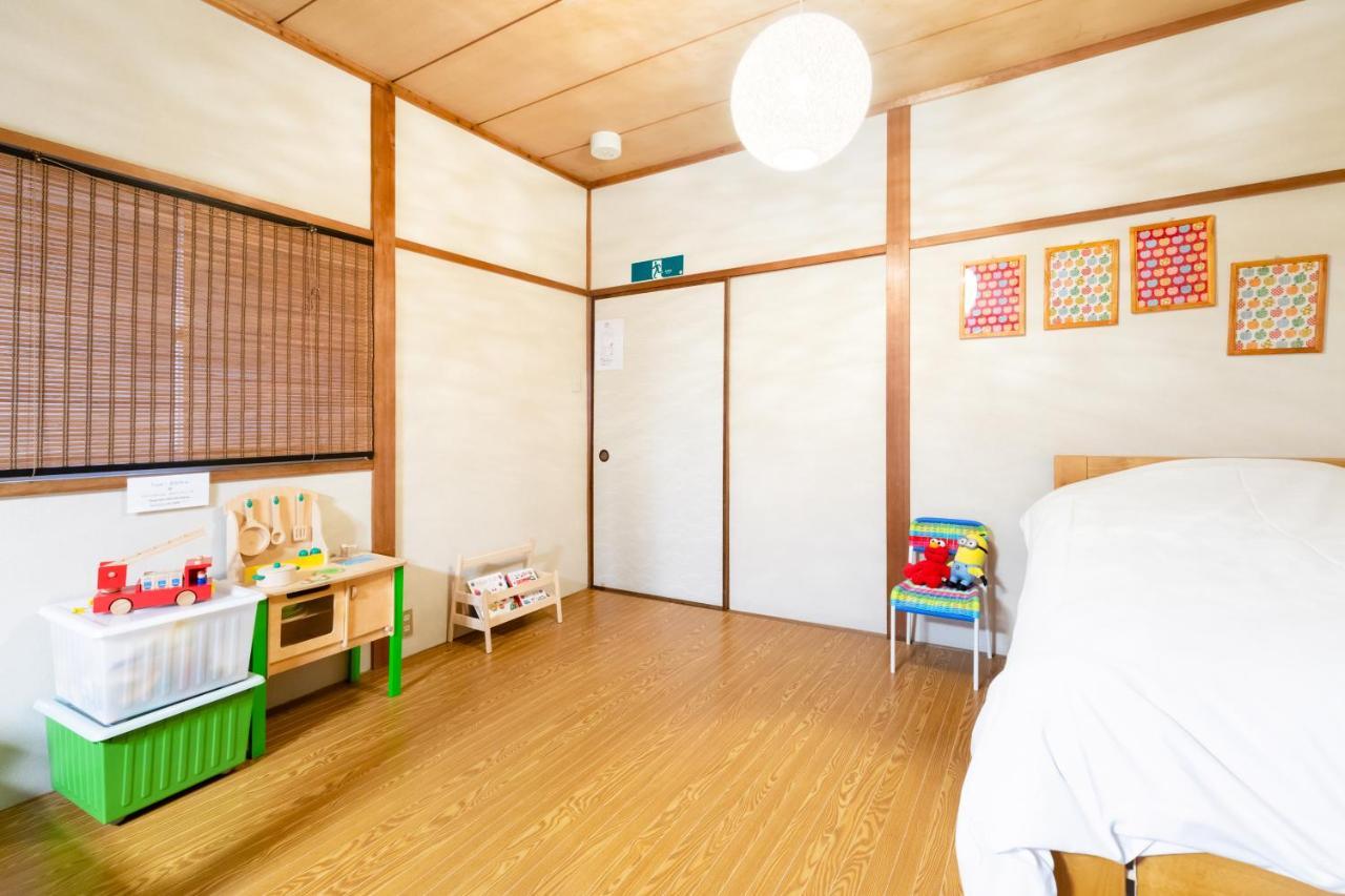 Chikyuutabikazoku Usj Apartment Осака Екстериор снимка
